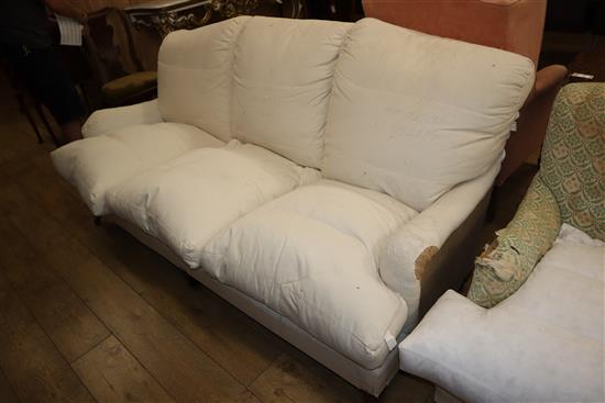 A Howard & Sons upholstered three seater settee, W.190cm D.96cm H.86cm